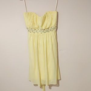 Strapless yellow empire waist dress